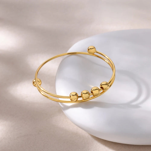 Aurum Coil Bracelet™ - Encircle the wrist, embody the infinite.